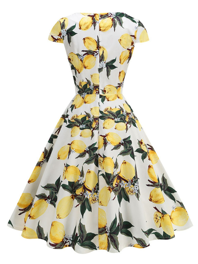 Yellow 1950s Surplice V-Neck Lemon Dress: where 1950s romance meets her modern spirit
