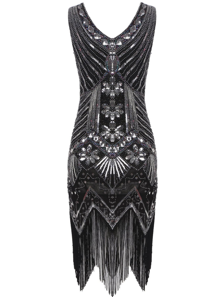 This 1920s Sequined Fringe Dress wraps her in 1920s elegance, one twirl at a time