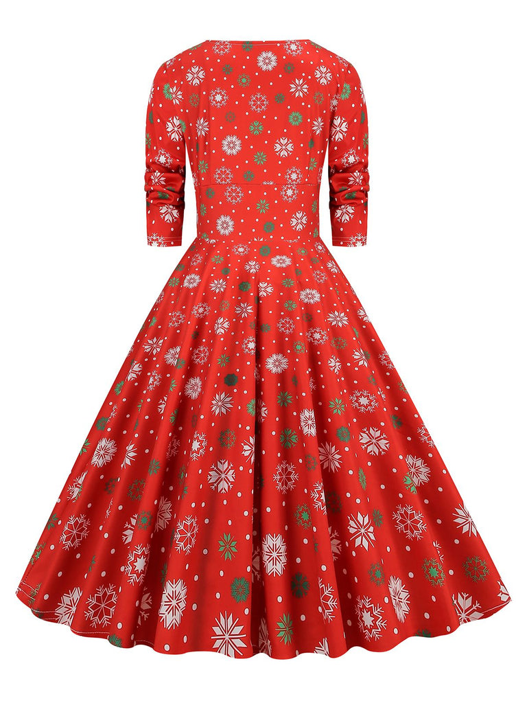She slips into this 1950s Christmas Patchwork V-neck Dress and suddenly it's a 1950s daydream