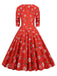She slips into this 1950s Christmas Patchwork V-neck Dress and suddenly it's a 1950s daydream