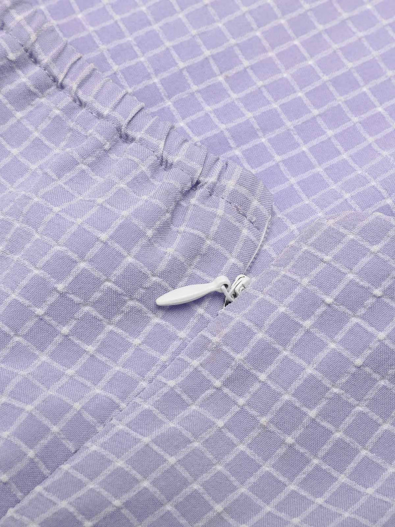 1950s Purple Halter Swing Vintage Dress — vintage elegance for the modern woman