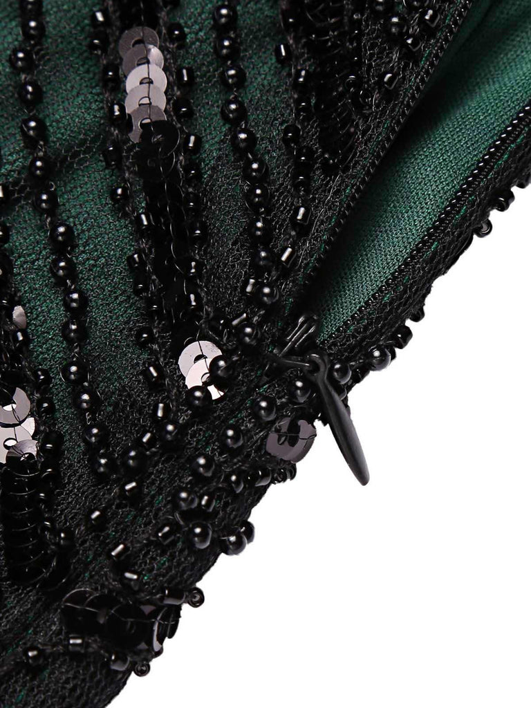 She slips into this Dark Green 1920s Sequined Flapper Dress and suddenly it's a 1920s daydream