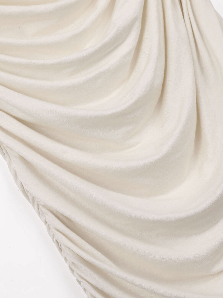 Ivory 1960s Cap Sleeve Slim Pleated Dress — vintage elegance for the modern woman