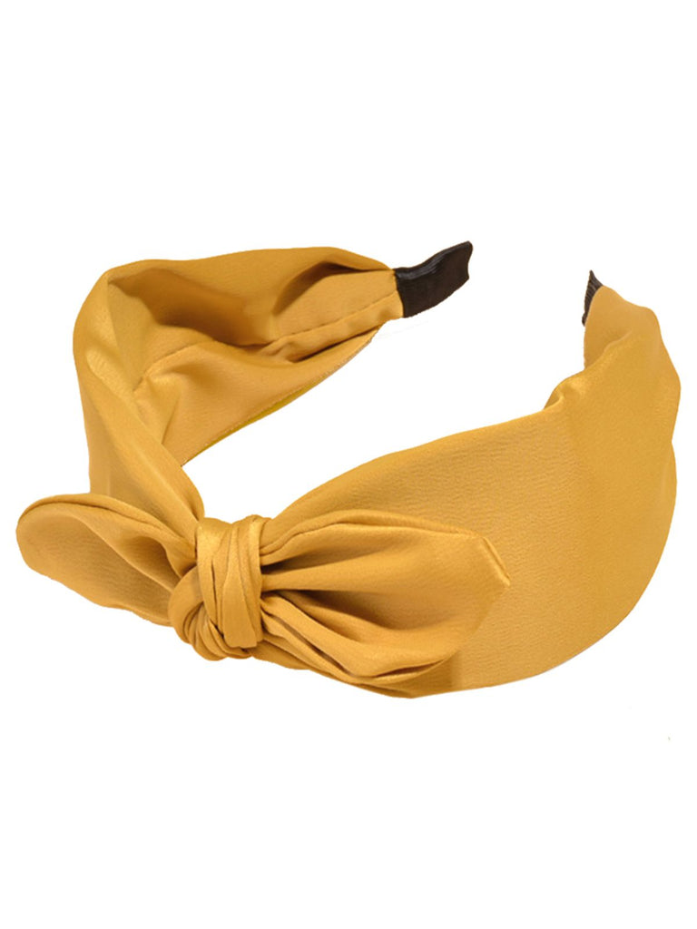 Retro Solid Knotted Bowknot Headband — vintage elegance for the modern woman