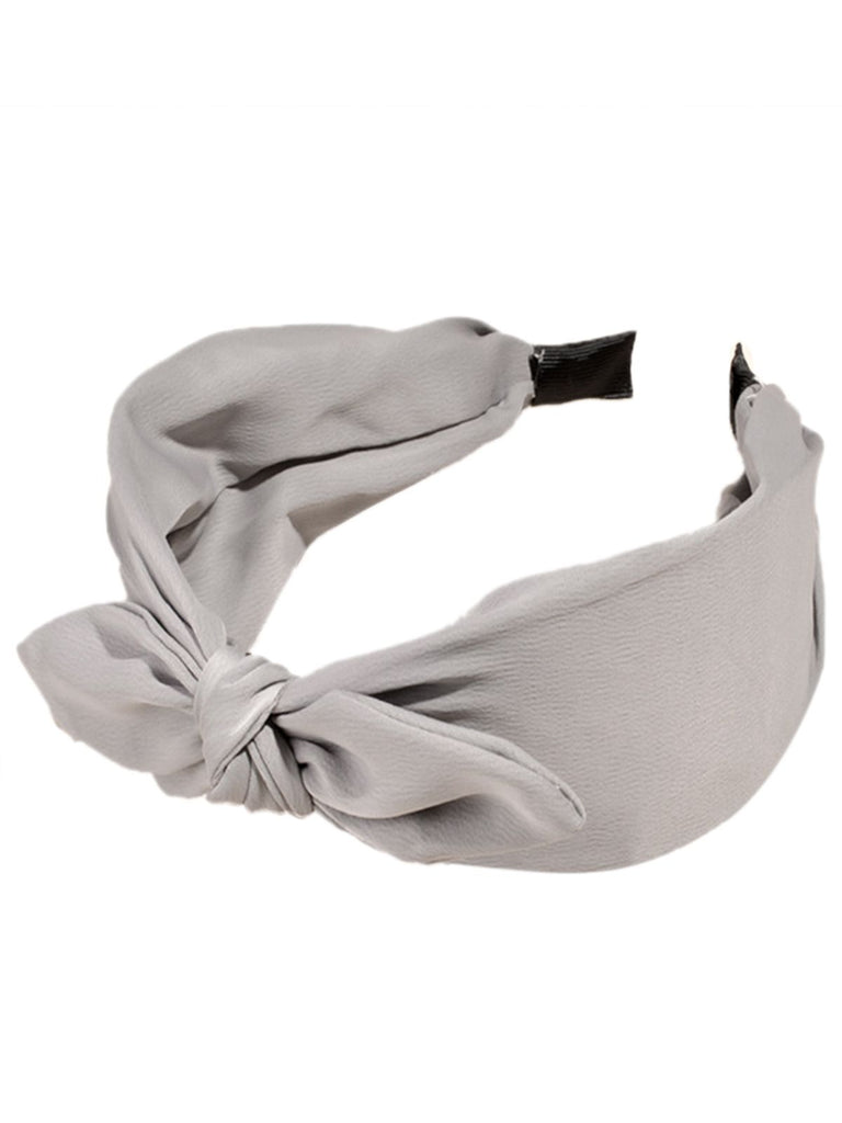 Retro Solid Knotted Bowknot Headband — vintage elegance for the modern woman