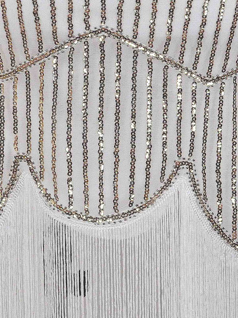White 1920s Fringed Flapper Dress — the kind of 1920s dress that makes strangers smile