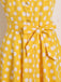 Yellow 1950s Polka Dot Straps Swing Dress — vintage elegance for the modern woman